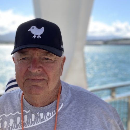 picture of Les Standiford with cap on a boat